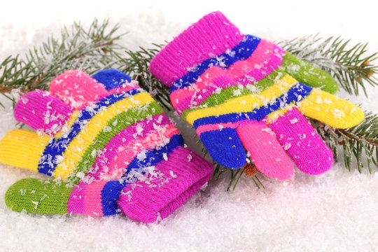 Children's mittens in snow