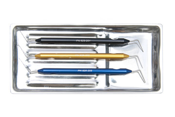Metallic dentist tools close up in a dentist clinic.