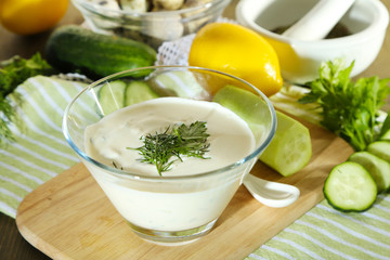 Cucumber yogurt in glass bowl,