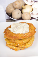 potato pancakes with mushroom sauce
