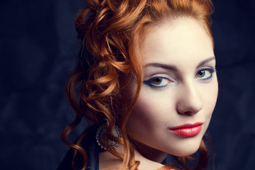 Fototapeta premium Vintage portrait of a glamorous queen like red-haired woman