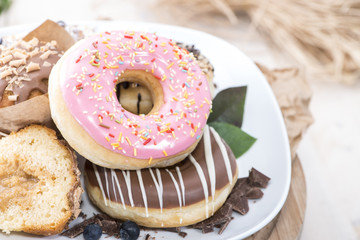 Heap of homemade Muffins and Donuts