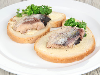 Tasty sandwiches with scomber, close-up