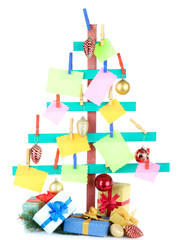 Wooden hand made fir tree with blank papers and Christmas