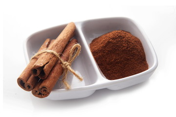 Cinnamon over white background
