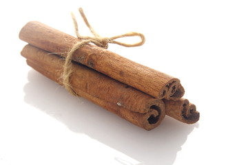 Cinnamon over white background