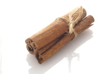 Cinnamon over white background