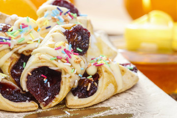 Christmas cookies filled with marmalade, decorated with colorful