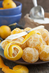 Fresh ripe orange tangerines on a wooden table. Preparing for co