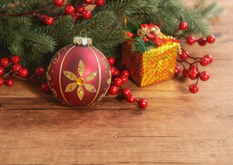 Christmas baubles on wooden background