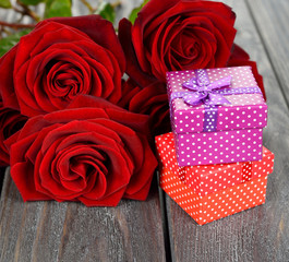 Box and red roses