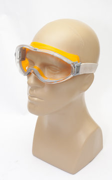 plastic mannequin wearing protective mask