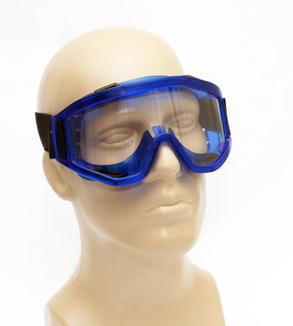 plastic mannequin wearing protective mask