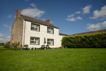 Country farm house with lawn