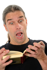 man is reading a enthralling book