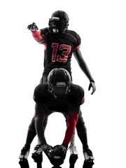 Foto op Canvas two american football players on scrimmage silhouette © snaptitude