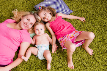 Happy mother and two children
