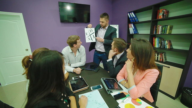 Coach explains team basis of the CASHFLOW Quadrant