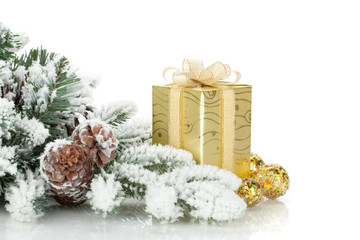 Gift box, christmas decor and snowy fir tree