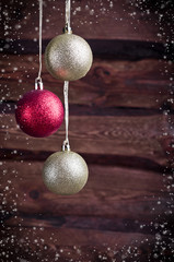 Christmas card with a gold and red toys