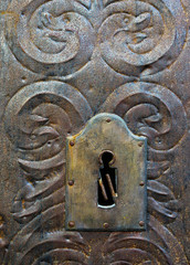 Metal medieval door with key hole