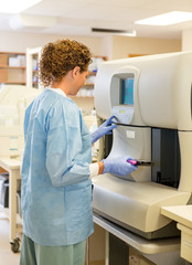 Female Lab Tech with Hematology Test Specimens