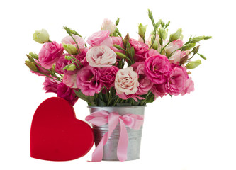 Pink eustoma flowers with red gift  box