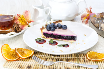piece of blueberry pie on a table in a restaurant
