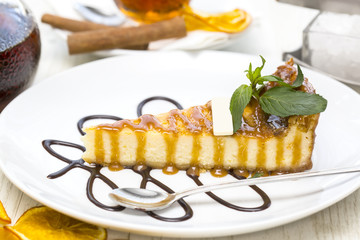 piece of cheese cake on a table in a restaurant