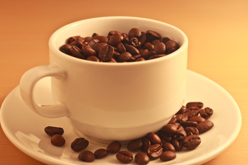 Coffee beans and cup