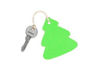 Key with christmas tree shaped blank label isolated on white