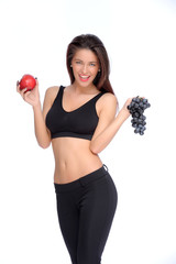 Cute young lady holding red apple while isolated on white..