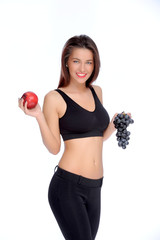 Cute young lady holding red apple while isolated on white..