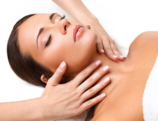 Face Massage. Close-up of a Young Woman Getting Spa Treatment.