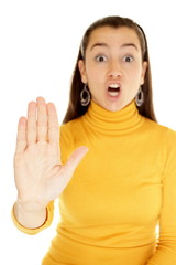 Close-up of a young woman gesturing stop