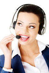 Attractive businesswoman on call centre.