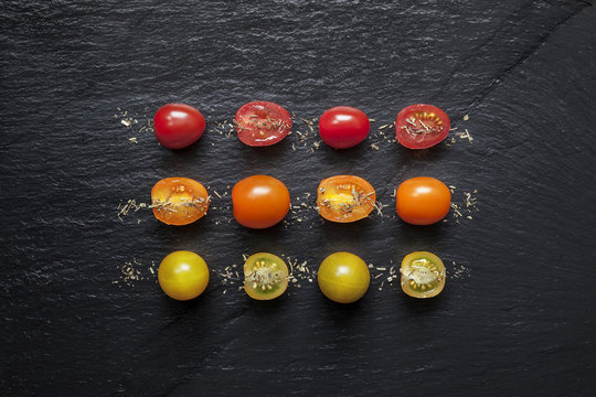 Tomates rouge et verte sur Ardoise