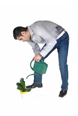 Man watering plant.