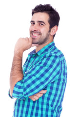 Fototapeta premium Portrait of a handsome latin man smiling, isolated over a white