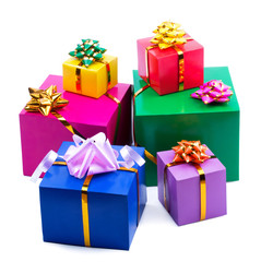 Gift boxes of different sizes and colors on white