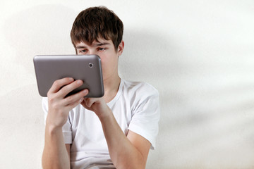 Young Man with Tablet