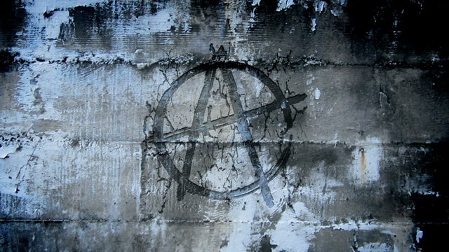Anarchy symbol in urban wall