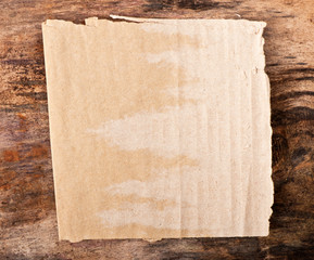 Paper on old wooden background