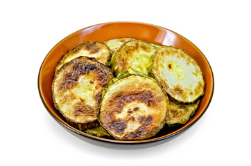 Zucchini fried in ceramic ware