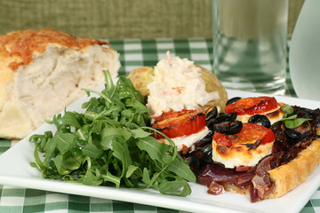 onion and goats cheese tart with rocket and potato
