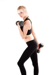 beautiful woman is engaged with dumbbells