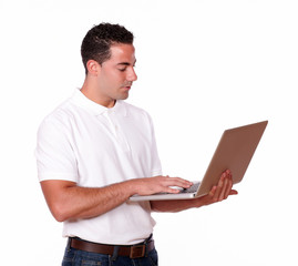 Attractive man working on his laptop