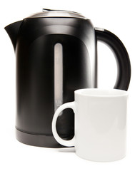 electric tea kettle on a white background and a mug