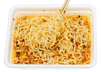 eating of instant noodles from lunch box