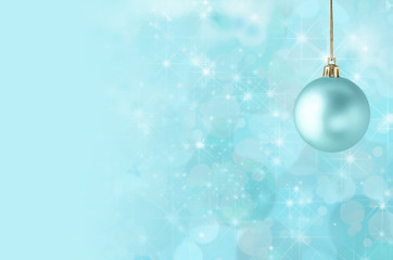 Christmas Bauble on Starry Bokeh Background